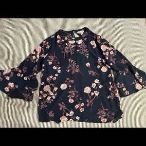 Dark blue floral blouse with 3/4 length sleeves
